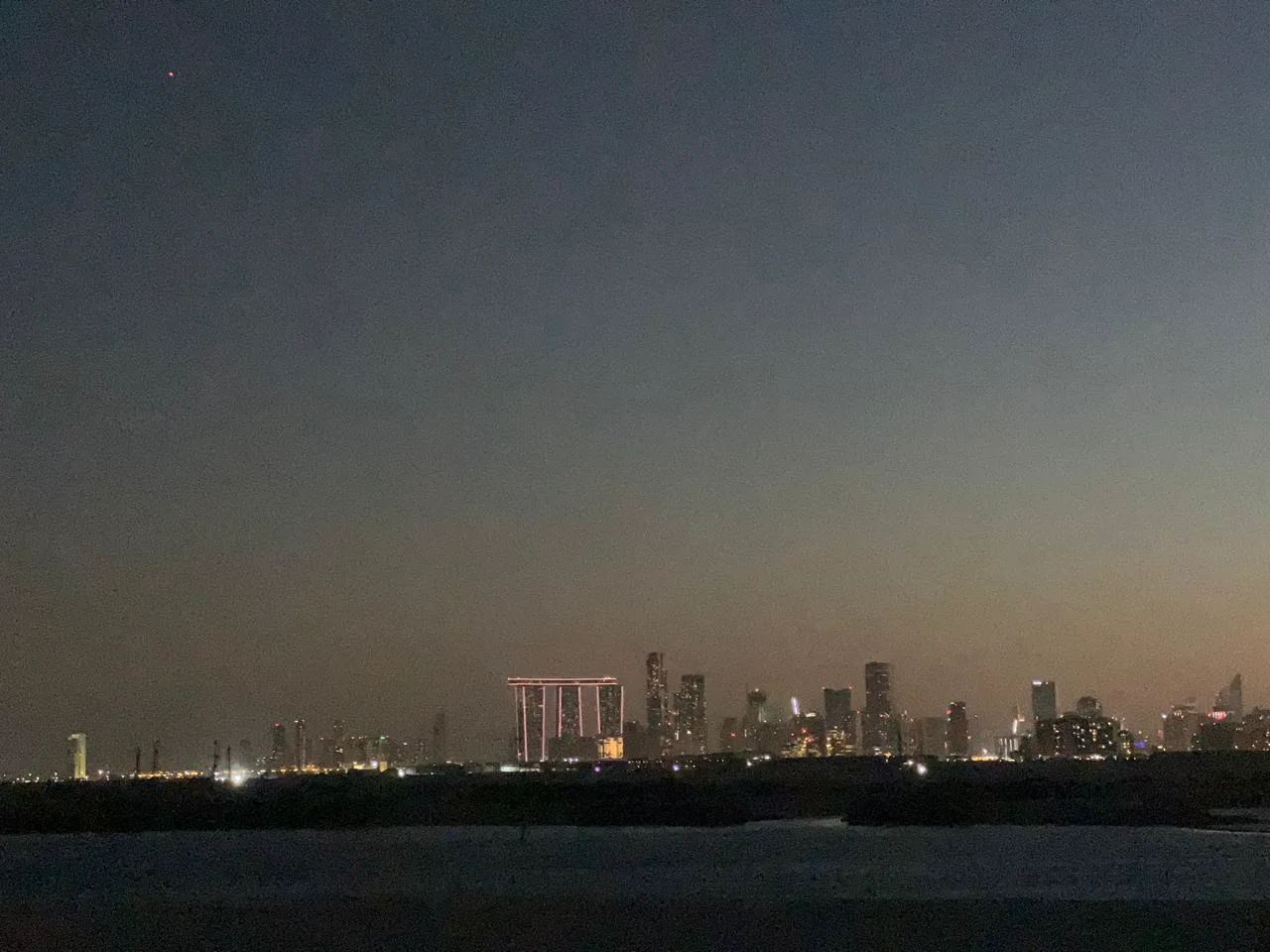 Abu Dhabi skyline at night from Al Jubail Island